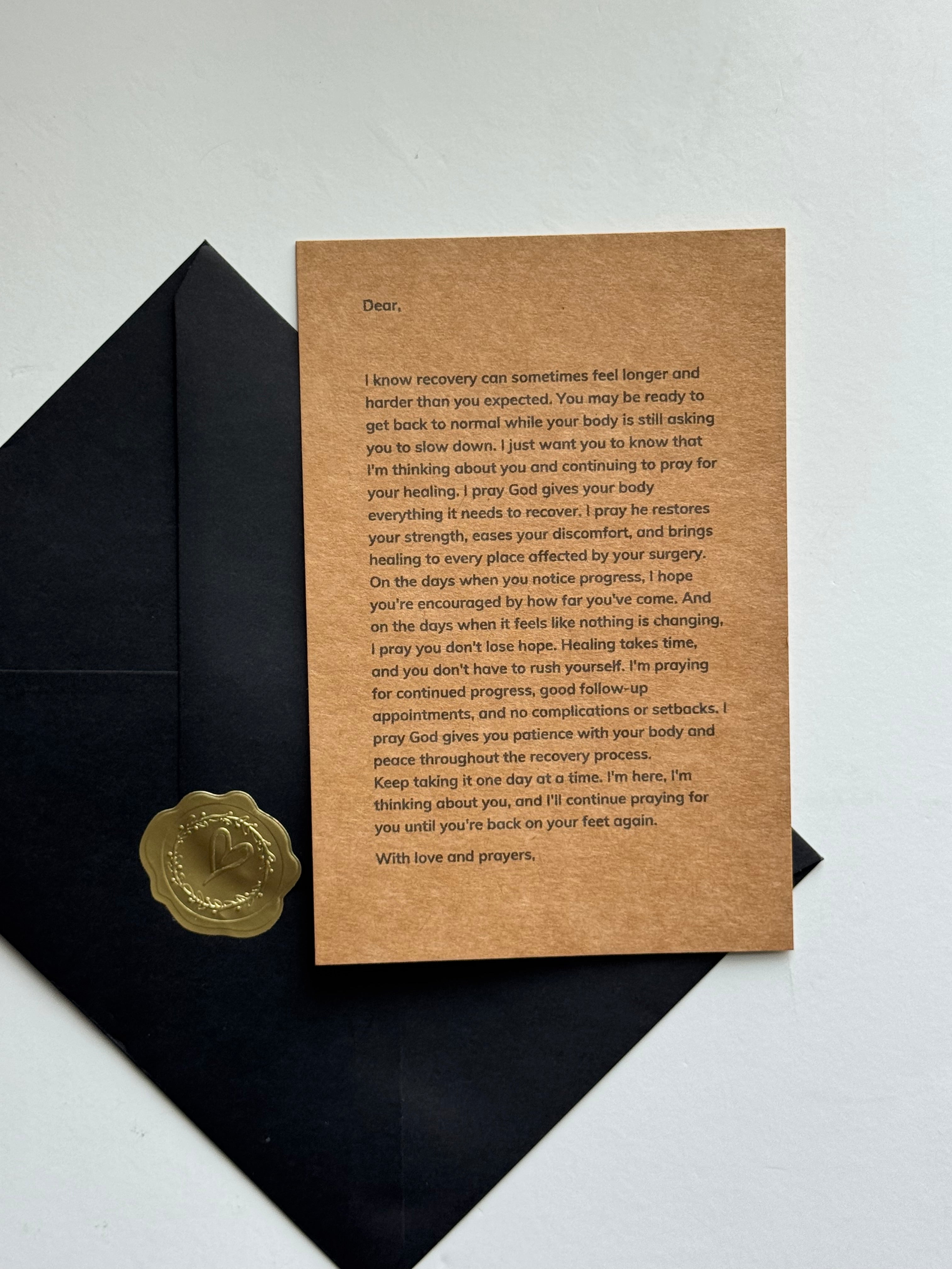Surgery recovery encouragement letter with black envelope and gold seal
